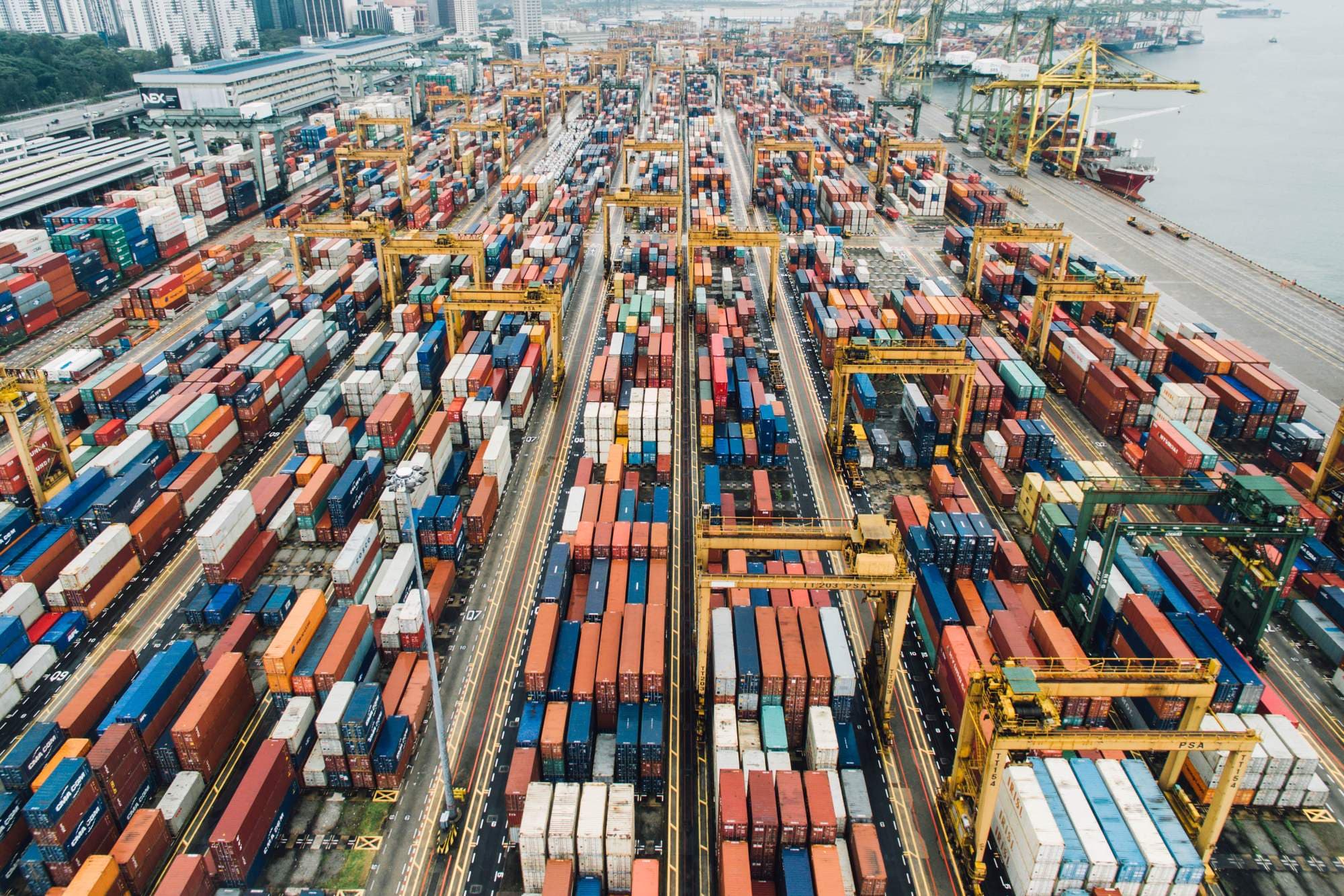 Shipping containers and cranes at an international container port